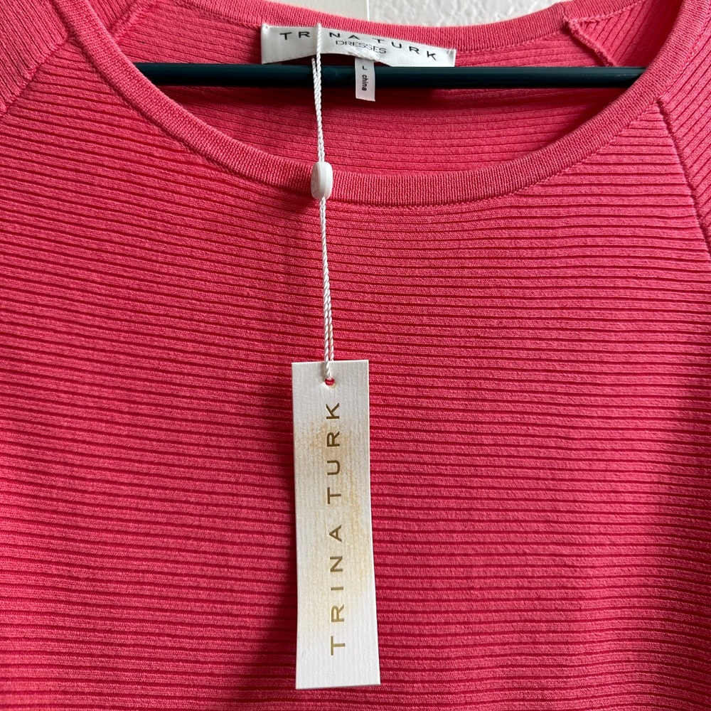 New with tag Trina Turk pink/fuchsia dress size L but fits an M/L.